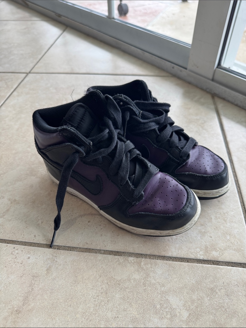 Nike Women’s High-Top Sneakers in Black and Purple